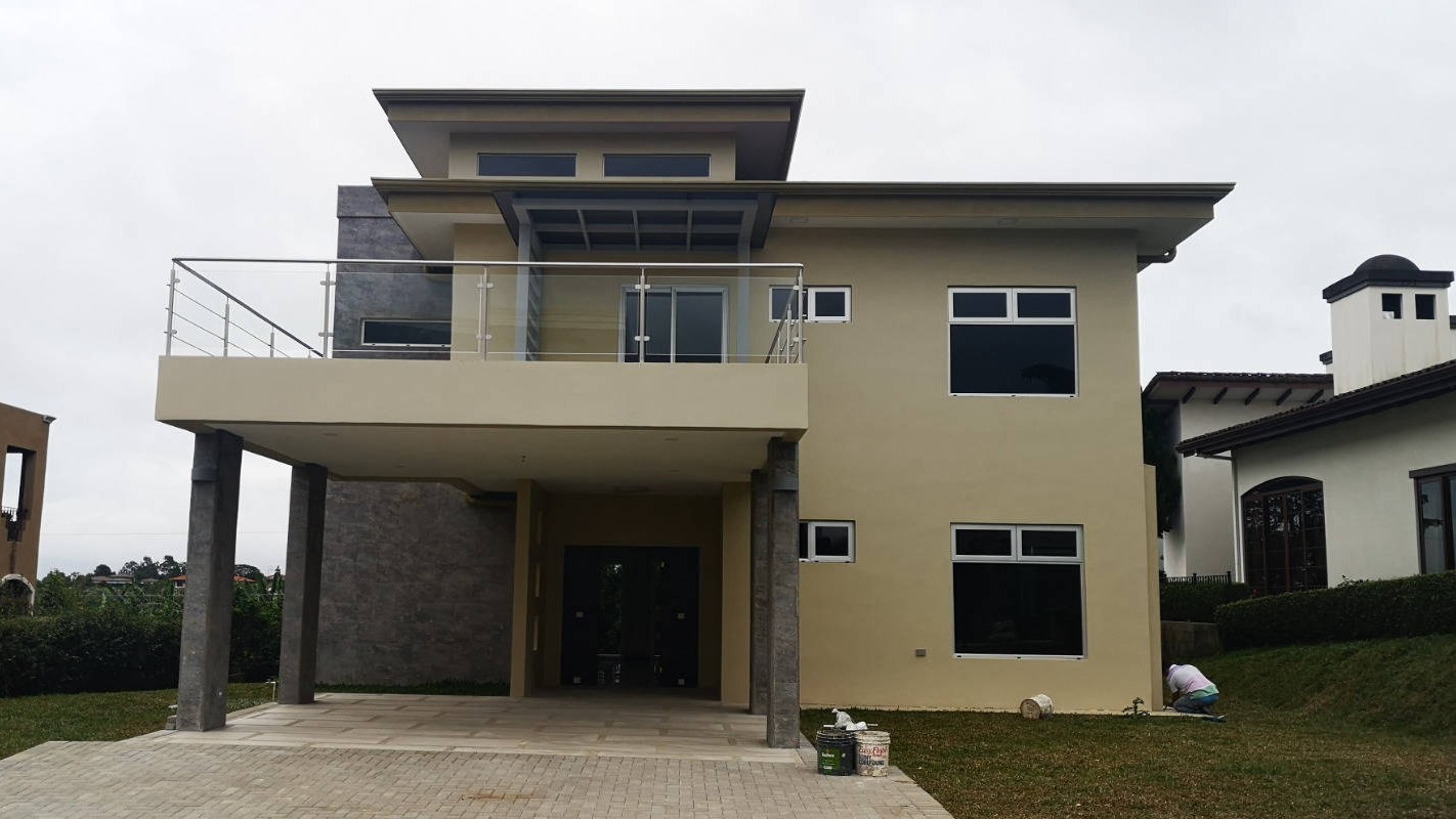 Contemporary two-storey home with a covered entrance